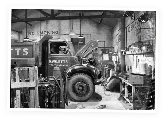 a black and white image of the original Schroeder Truck Repair shop