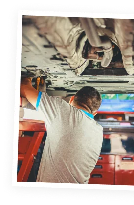 a mechanic performing fleet maintenance